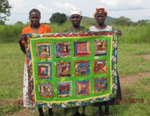 We  call this the Congo Log quilt. The women cut and design the squares themselves.